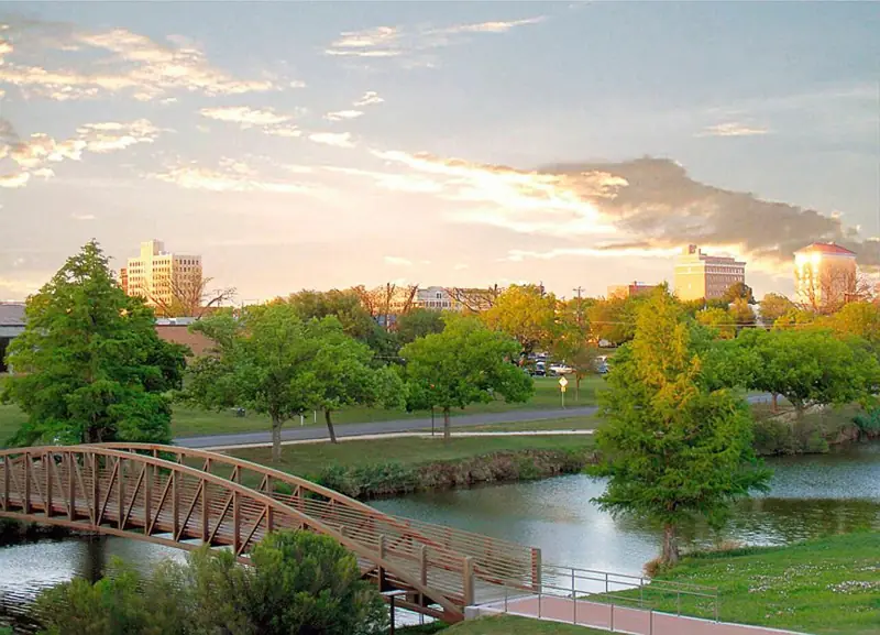 Park along the Concho River in San Angelo, Texas at sunset.